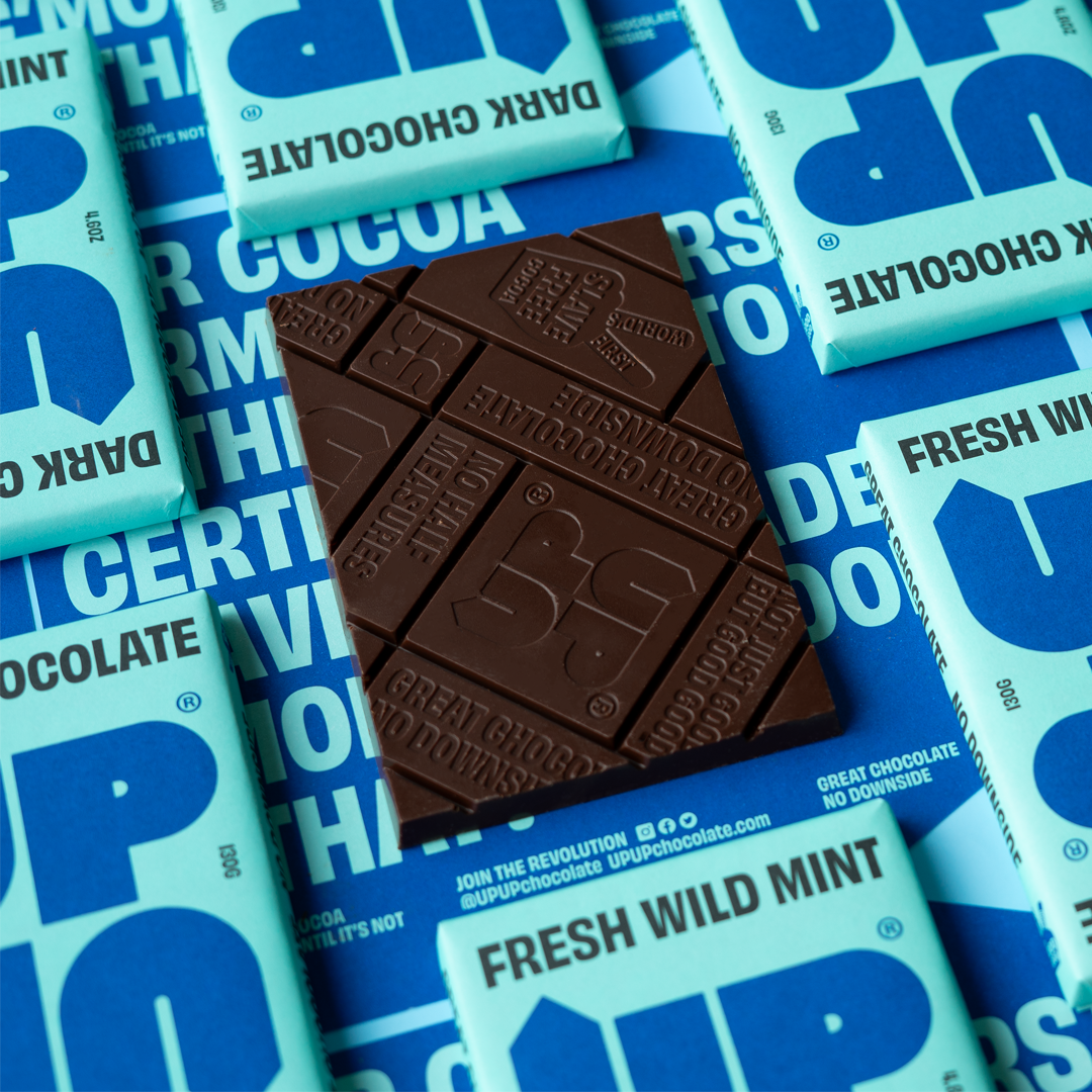 UP-UP Ethical Wild Mint Dark Chocolate Bar - showing the chocolate bar out of it's packaging showing design by penny black