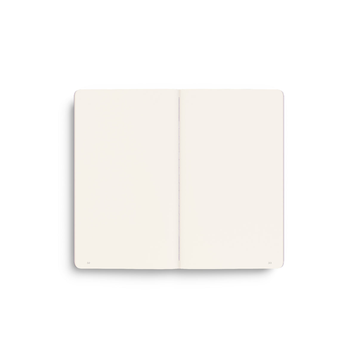 An open notebook with blank, warm off-white pages, shown from a top-down perspective on a clean white background.