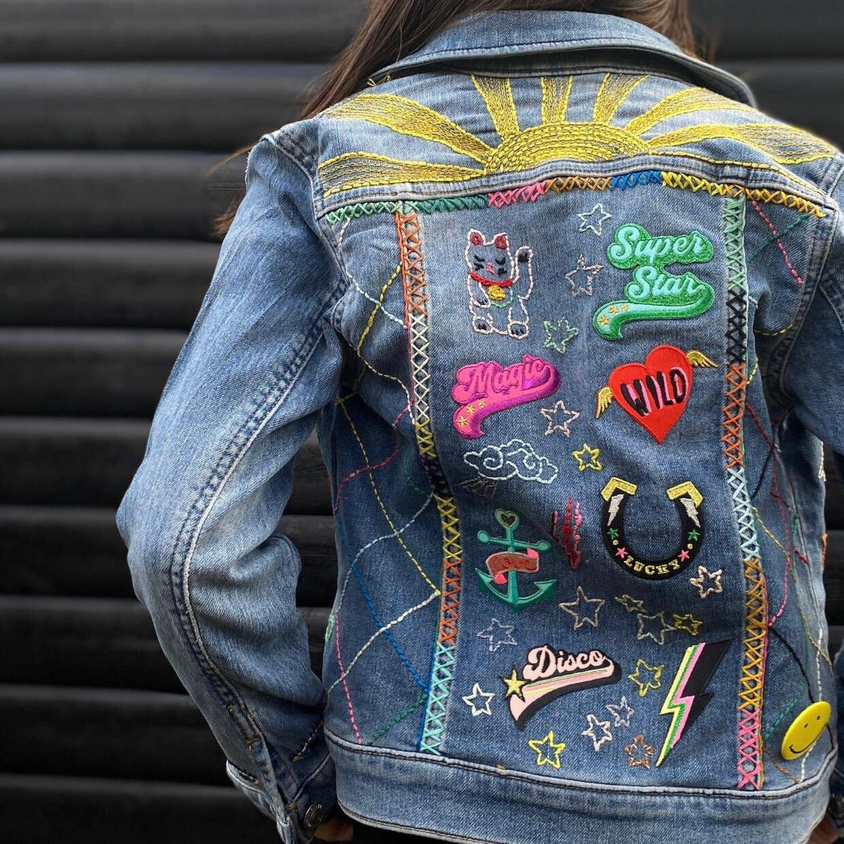 Colourful Iron on Patch - Moka Coffee Pot by penny black showing back of denim jacket with lots of patches