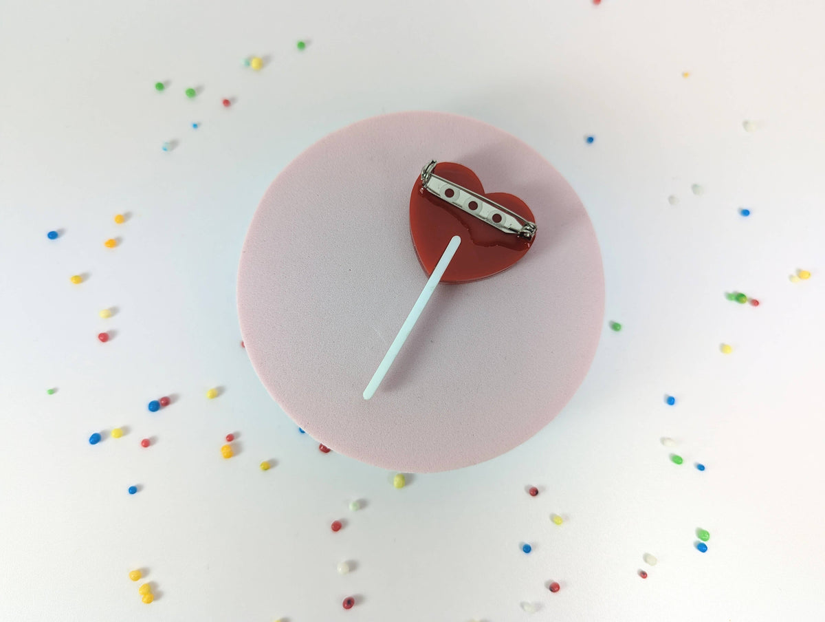 Red Heart Lollipop Glitter Brooch by penny black showing backing