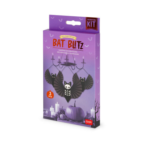 A boxed DIY Halloween decoration kit labeled 'BAT BLITZ' on a purple package, shown against a plain white background. The box features illustrations of black bats, candles, pumpkins, and a chandelier.