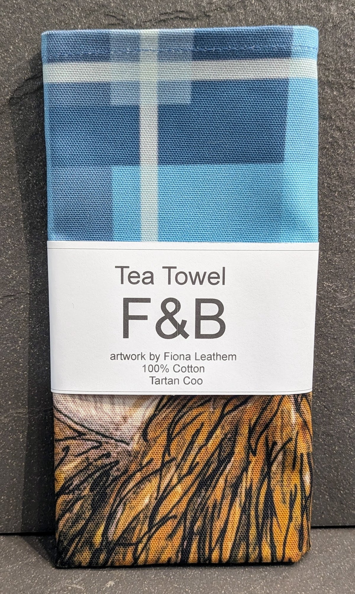 Tartan Highland Coo Tea Towel by penny black showing packaging