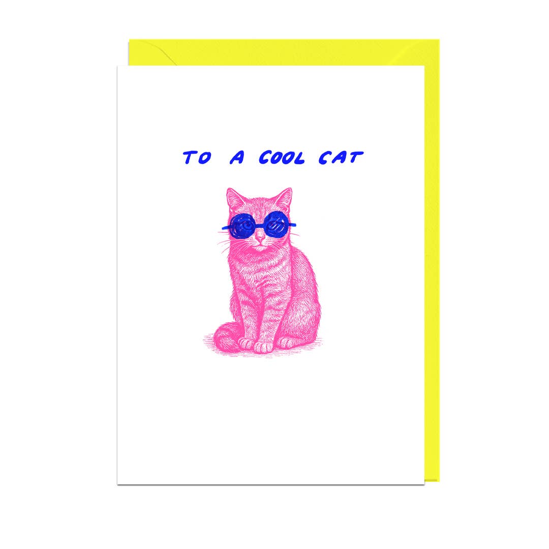 Greeting card with a pink cat wearing sunglasses and text 'To a cool cat' on a white background with yellow envelope.