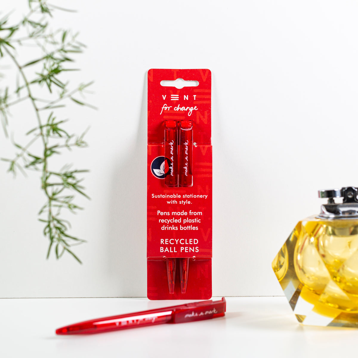 Make a Mark Recycled Pen 2 pack set by Vent for Change in it's packaging against a wall in colourway blood red