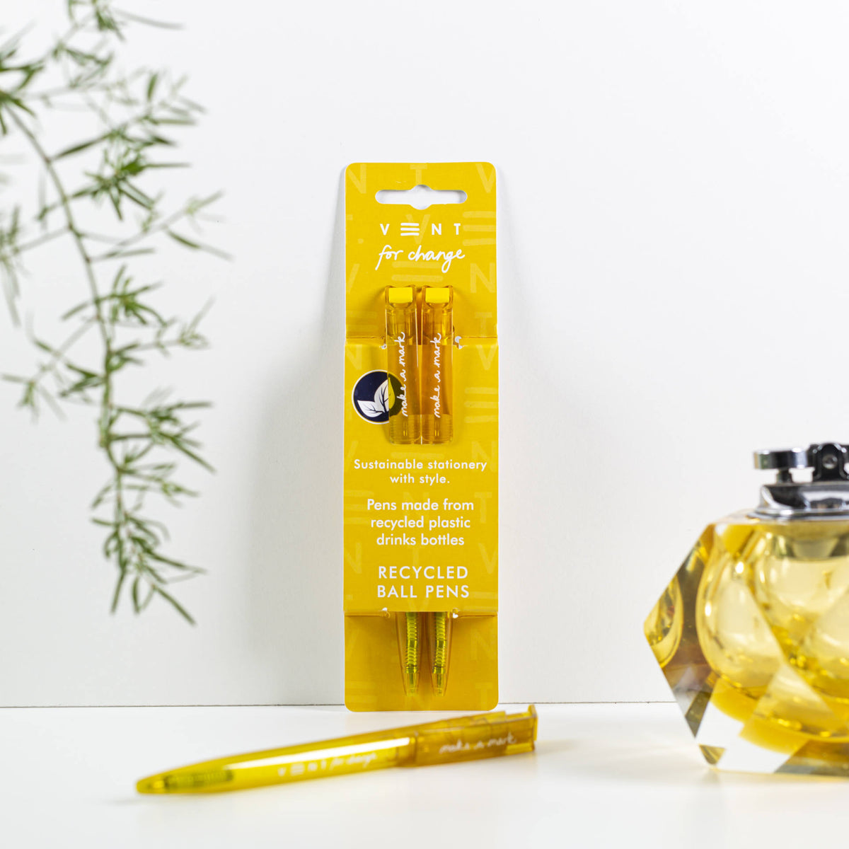 Make a Mark Recycled Pen 2 pack set by Vent for Change in it's packaging against a wall in colourway mustard yellow